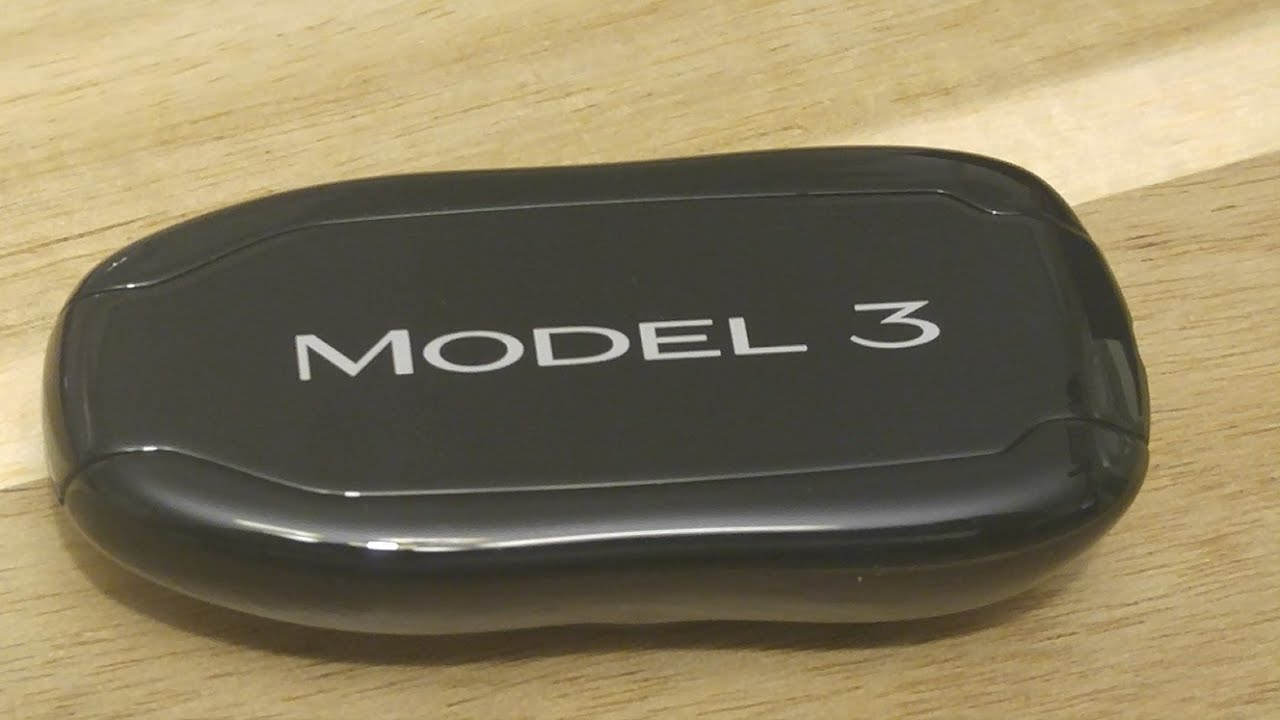 Tesla key fob battery replacement tutorial showing CR2032 batteries and tools for Model S, 3, X, Y maintenance guide