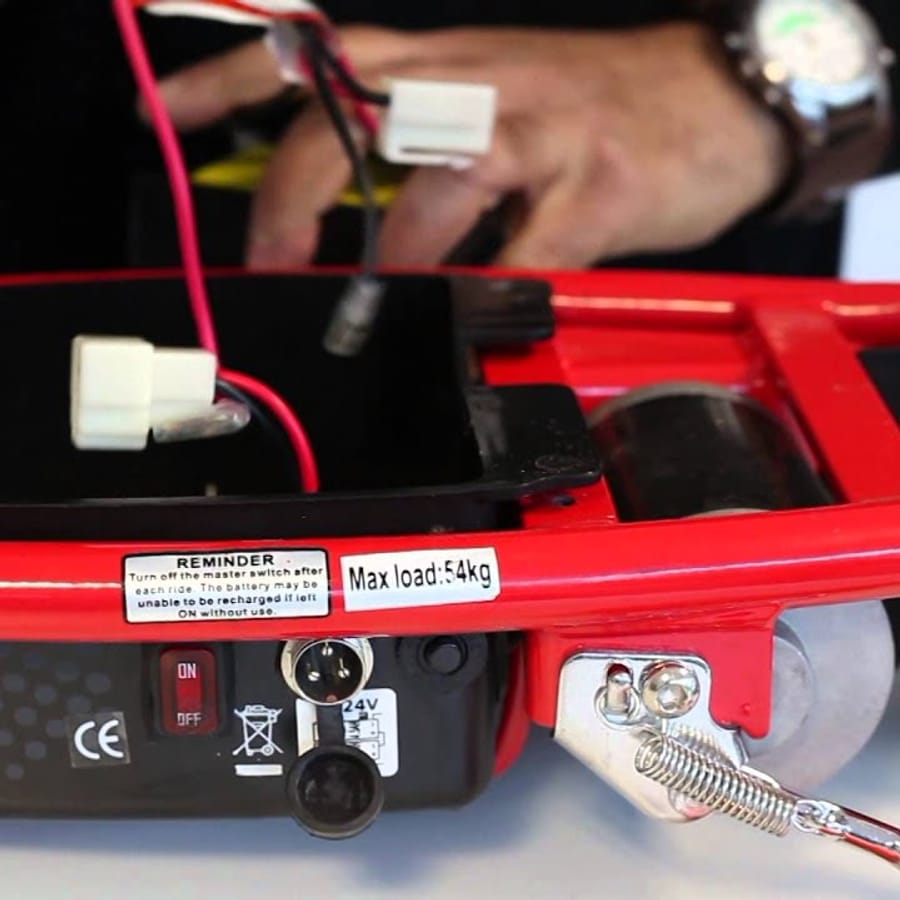 Electric scooter showcasing its battery compartment