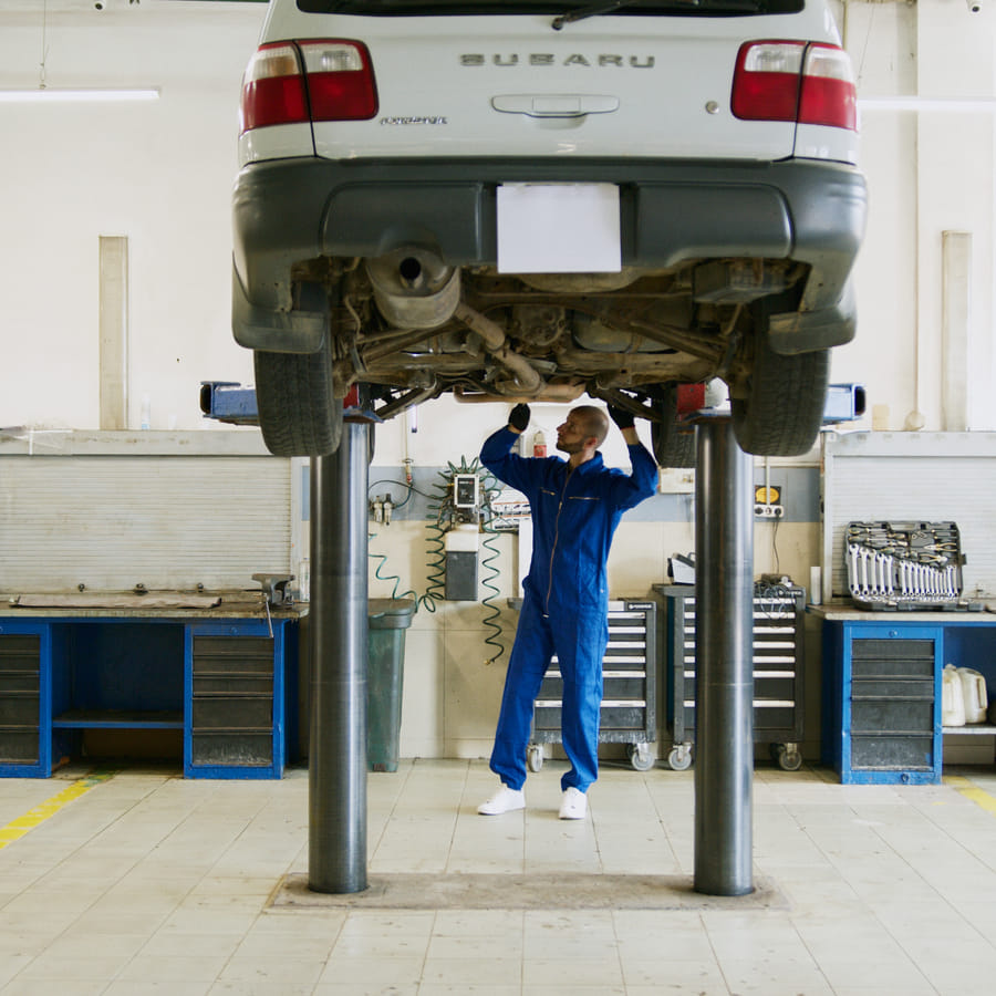 Person performing a car battery health check