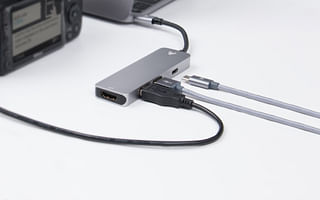 Can I use a portable charger to charge my laptop battery?